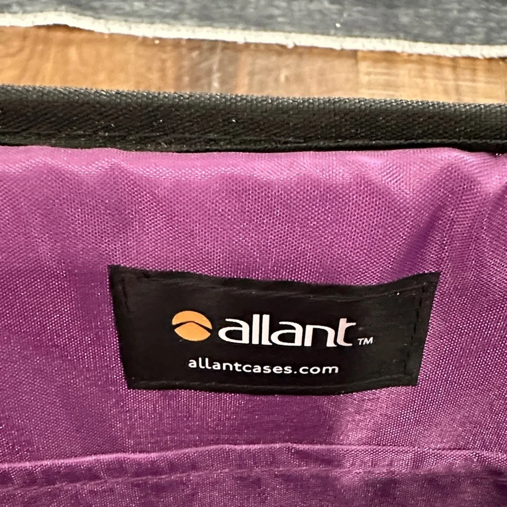 Elegant Black Laptop Bag with purple interior